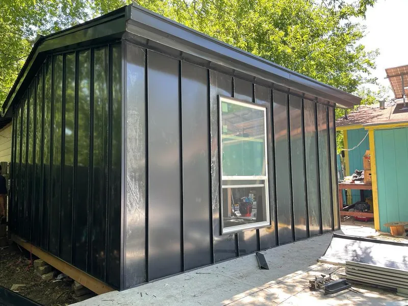 Black standing seam metal wall panels for Metal Roof Installation in Whiskey Creek