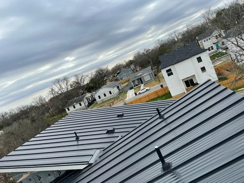Standing seam metal roof panels with vents for Skylight Repair in Whiskey Creek